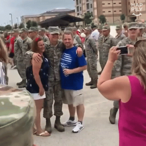 Soldiers Posing For Woman Photographer GIF