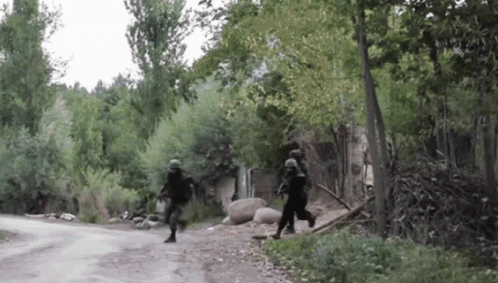 Soldiers Running Down Forest Road GIF