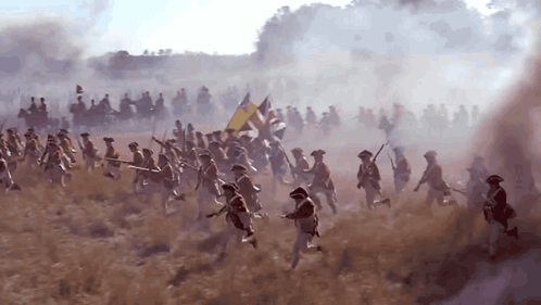 Soldiers Running Through Smoky Field