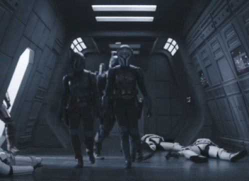 Soldiers Standing in Dark Hallway