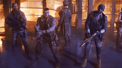 Soldiers Standing in Front of Burning Building