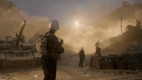 Soldiers Standing In Front Of Tanks GIF