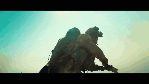 Soldiers Standing With Guns GIF