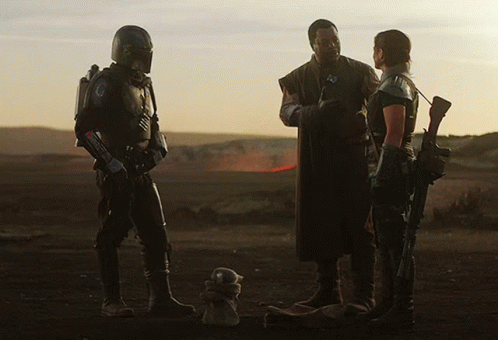 Soldiers Talking in Desert with Teddy Bear