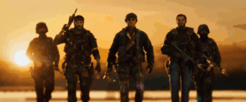 Soldiers Walking In Line With Sun GIF