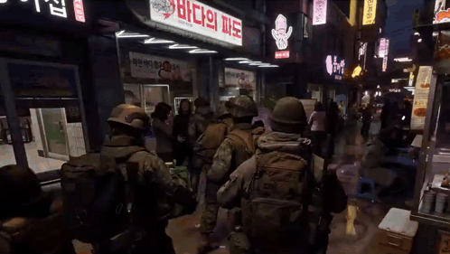 Soldiers Walking Past Store Saying Squid