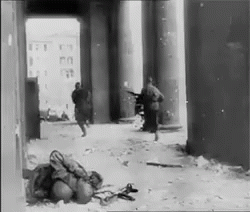 Soldiers Walking Through Tunnel