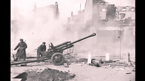 Soldiers With Cannon In Black And White GIF