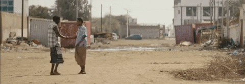 Somalia Men Hugging GIF