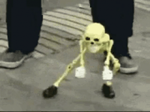 Someone Dancing Skeleton With Gloves And Shoes GIF