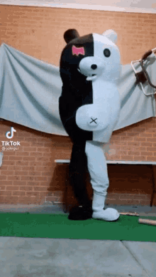 Someone In Monokuma Costumes GIF
