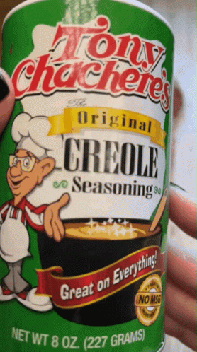 Someone Is Holding A Can Of Tony Chacheries Original Creole Seasoning GIF