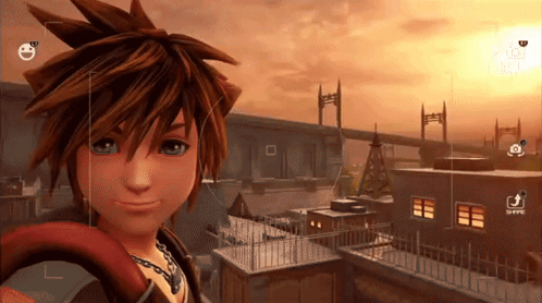 Sora From Kingdom Hearts Is Taking A Selfie With A Camera GIF