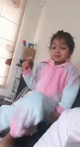 Cute Little Girl Sorry Not Sorry Reaction GIF