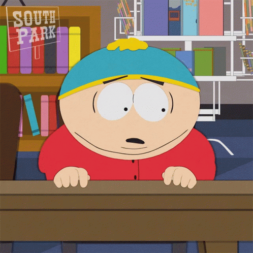 South Park Cartoon Character Sitting at Desk