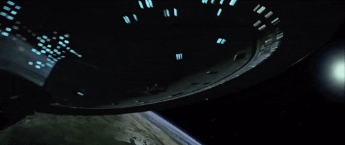 Spaceship Flying Over Earth