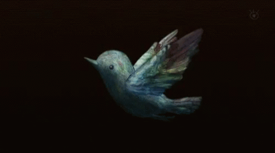 Sparkling Bird Flying GIF