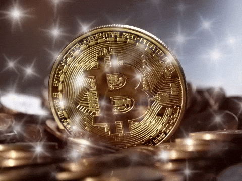 Sparkling Bitcoin Surrounded By Coins GIF