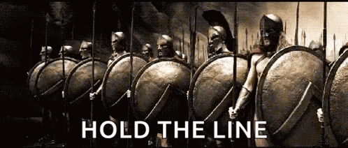 Spartan Soldiers With Shields And Spears Hold The Line GIF
