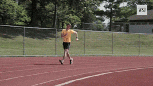 Speed Walking Man In Orange Shirt GIF
