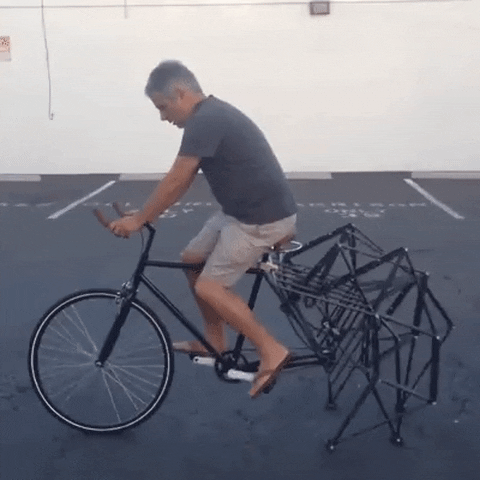 Spider Bike Riding GIF