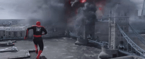 spider-man is flying through the air with his arms outstretched in a cloudy sky .