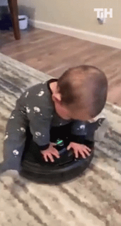 Spin Roomba Robot Vacuum Baby GIF