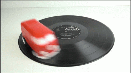 Spinning Bus Toy On Broken Record GIF