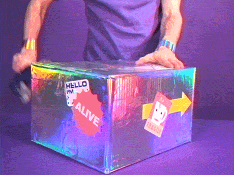 Spinning Colorful Large Gift Box GIF