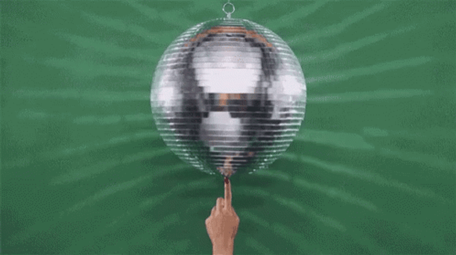 Spinning Disco On Ball Finger GIF