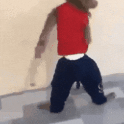 Spinning Monkey Wearing Human Clothings GIF