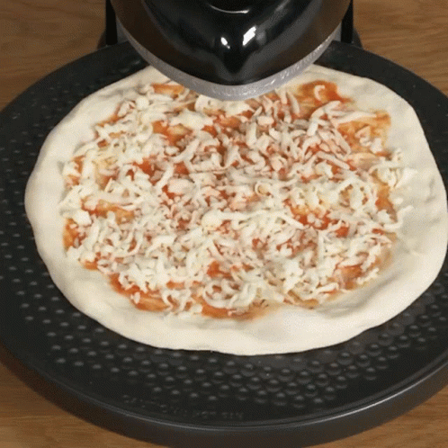 Spinning Pizza On Cheese Machine GIF