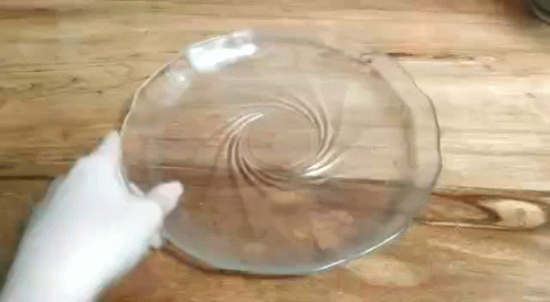 Spinning Plate Slowly With Hand GIF
