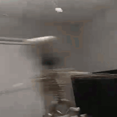 Spinning Quickly Skeleton On Fan Meme GIF