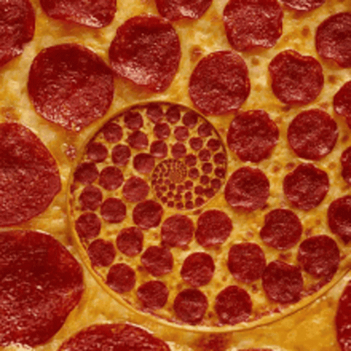 Spiral Spinning Peperoni Pizza GIF