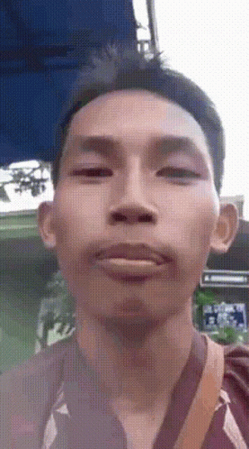 Boy Disgusting Spit To Camera GIF