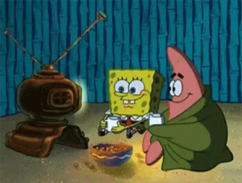 Spongebob And Patrick Playing Video Game With Bowl Of Cereal GIF