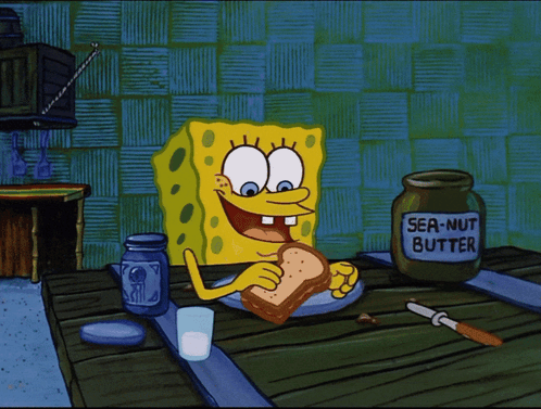 SpongeBob Eating Sandwich Next To Jar Of Peanut Butter GIF