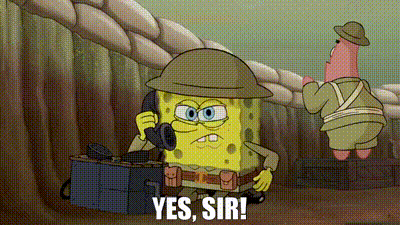 Spongebob Is Wearing A Helmet And Talking On A Cell Phone While Patrick Stands Behind Him . GIF