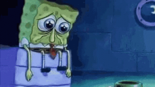 Spongebob Sitting On Blue Box Eyes Closed Mouth Open