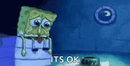 Spongebob Sitting on Box in Dark Room