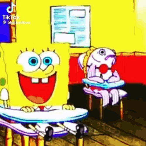 Spongebob Squarepants Is Sitting At A Desk In A Classroom With A Fish . GIF