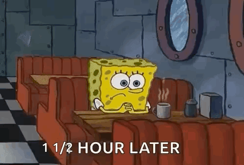 Spongebob Squarepants Is Sitting At A Diner Table With A Cup Of Coffee . GIF