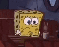 Spongebob Squarepants Is Sitting At A Table With A Cup Of Coffee And A Sad Face . GIF