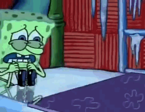 Spongebob Squarepants Is Sitting On The Floor In Front Of A Red Door With Icicles Hanging From It . GIF