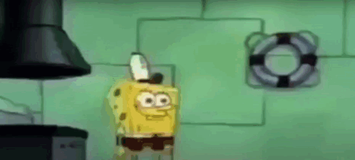 Spongebob Squarepants Is Standing In A Kitchen With A Life Preserver On The Wall Behind Him . GIF