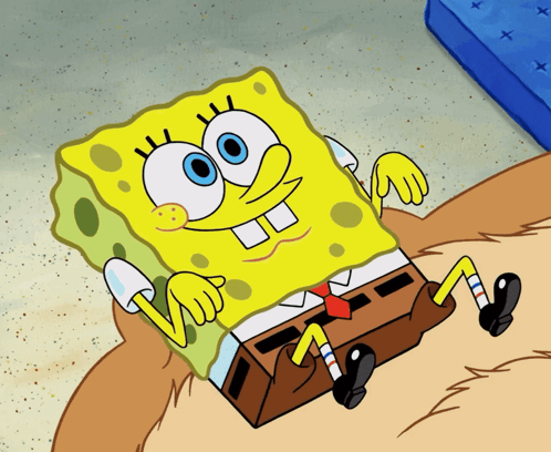 Spongebob Squarepants Laying on Sandy Beach