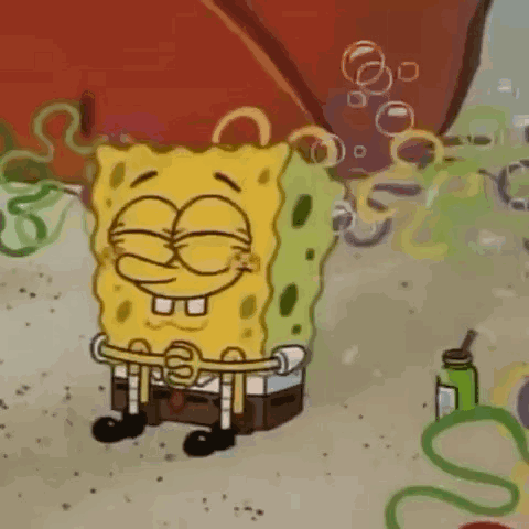 Spongebob Squarepants Sitting on Beach Hands Folded