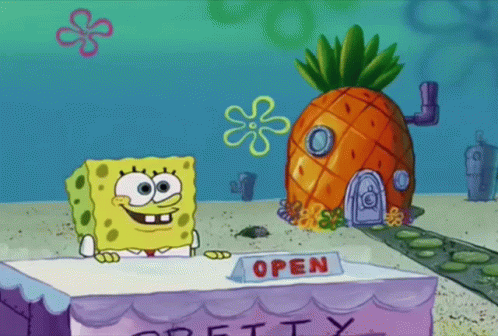 Spongebob Stands Behind A Table That Says Open GIF