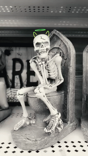Spooky Scary Skeletons Sitting On Toilet GIF